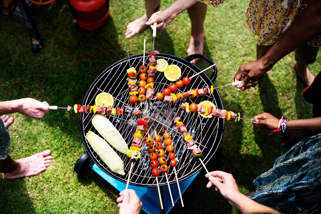 Front Page -AU Camping Equipment Sales aerial view diverse group friends grilling barbecue outdoors 53876 42727
